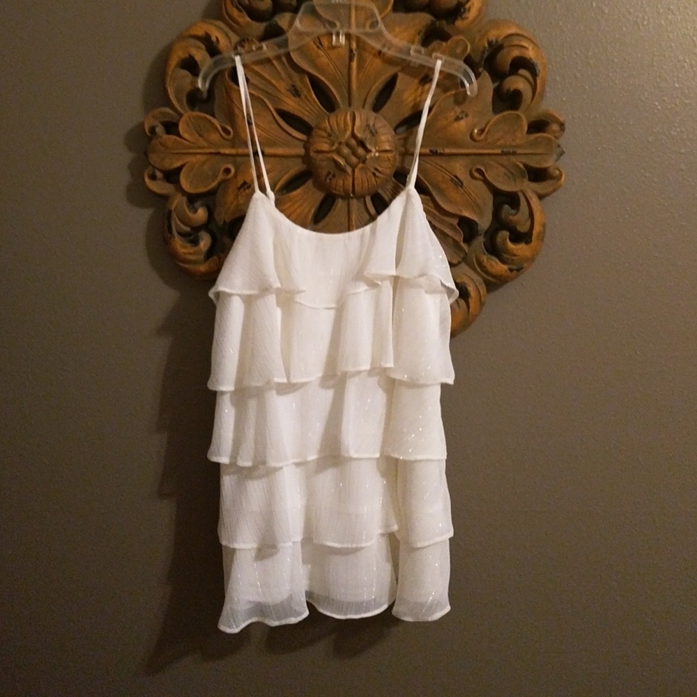 Ivory Ruffled Sleeveless Blouse