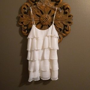 Ivory Ruffled Sleeveless Blouse