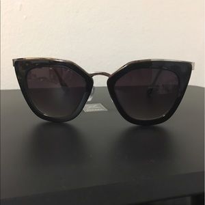 Cat eye sunglasses- very similar to PRADA!