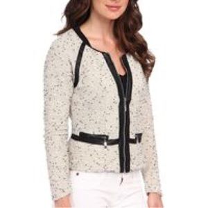 Cream tweed and black leather jacket