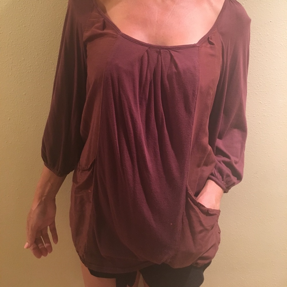 Burgundy colored women's top.