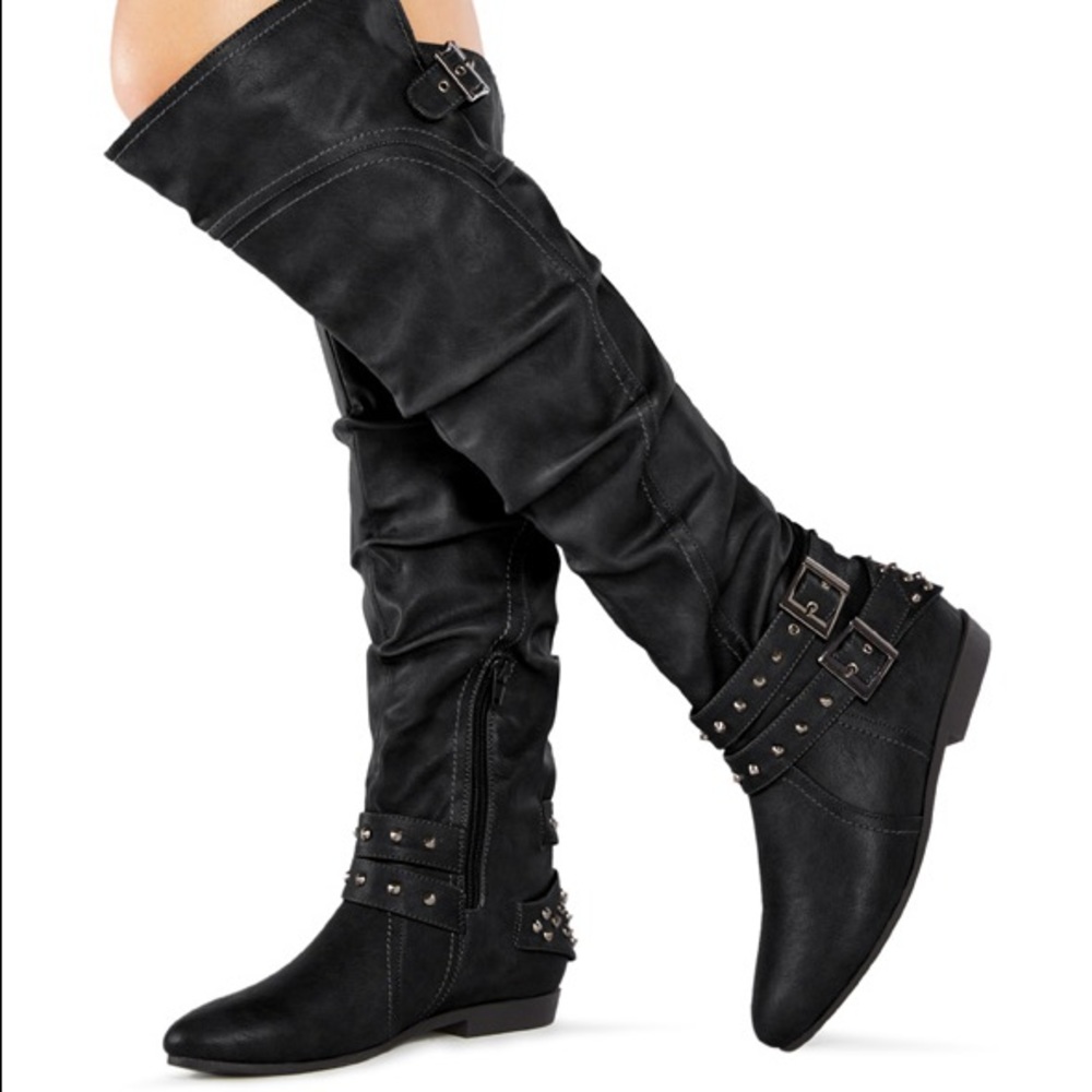 Tall studded boots