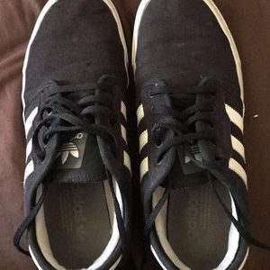 Black and white adidas shoes