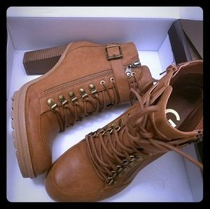 Medium browm g by guess boots