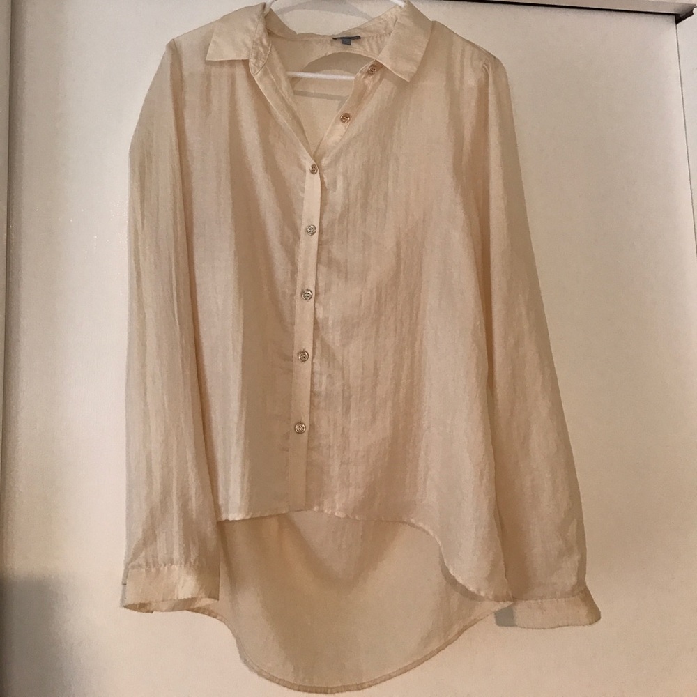 Long sleeve ivory blouse with a slightly open back