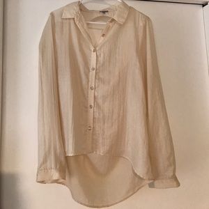 Long sleeve ivory blouse with a slightly open back