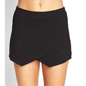 Black asymmetrical skort. Never worn