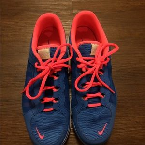 Coral/pink and Blue Nike sneakers/tennis shoes