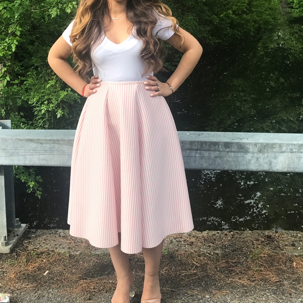 Pink and white striped midi skirt.