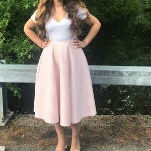 Pink and white striped midi skirt.