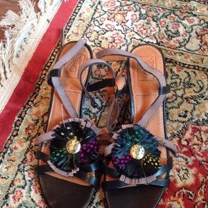 Never worn strappy sandals with feather accent