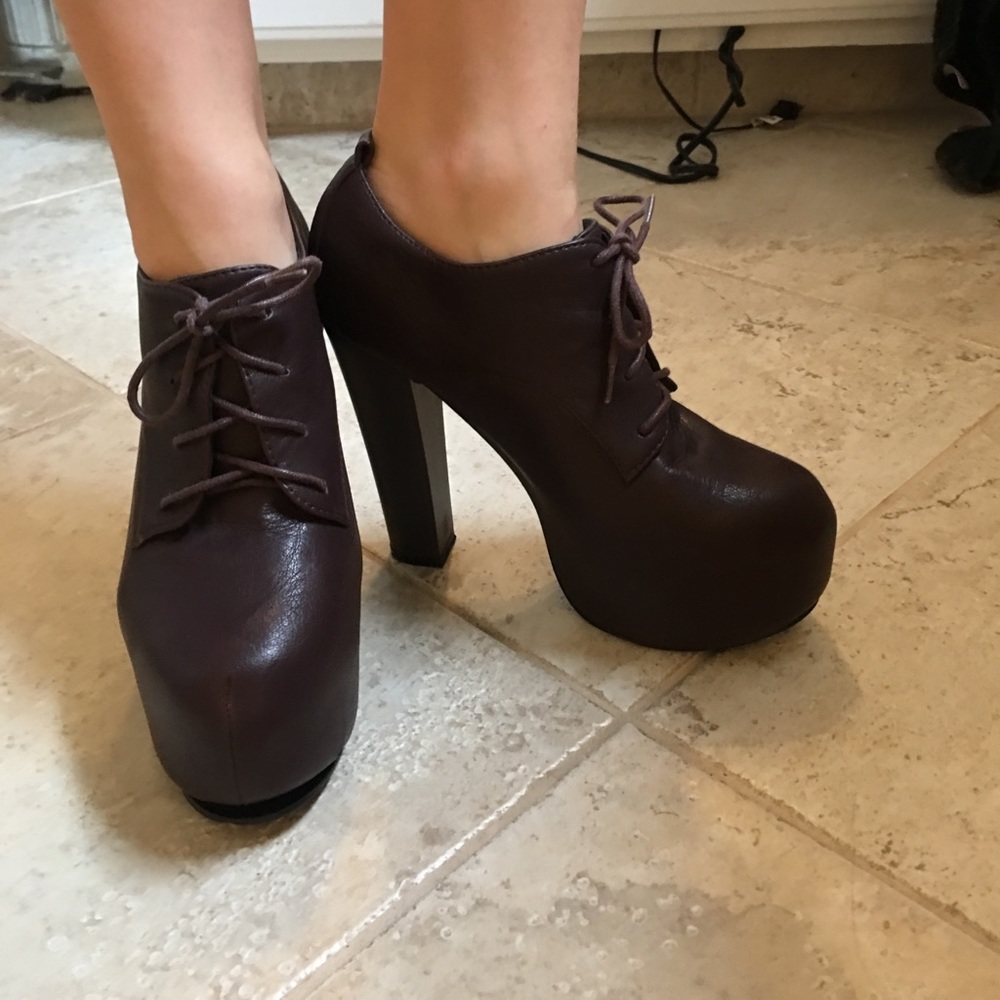 Dark purple close toed heeled booties
