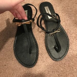 Barely worn black sandals with a golf bow