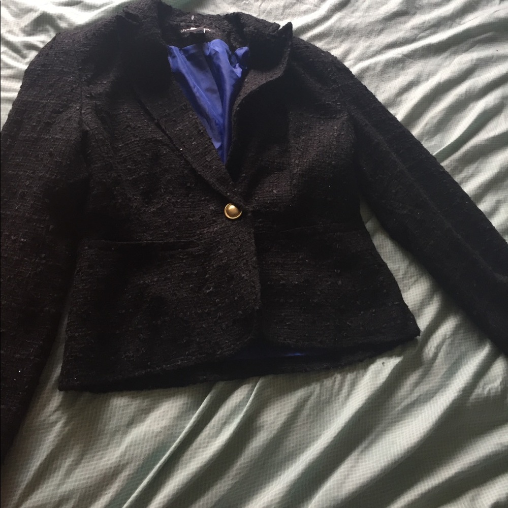 This a black texture blazer