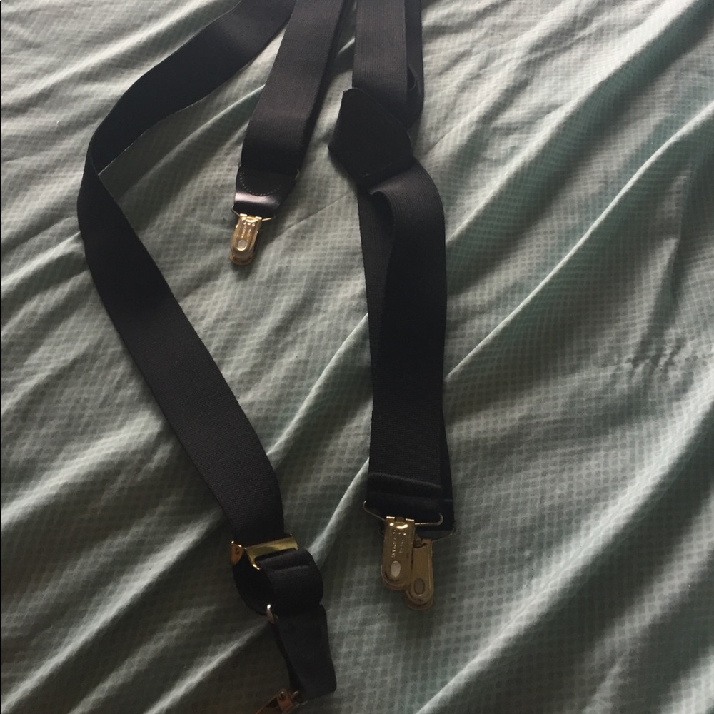 This is black suspenders with gold plates