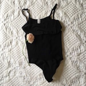 Wolford bodysuit. Black. size Medium.