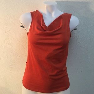 Burnt orange sleeveless blouse
