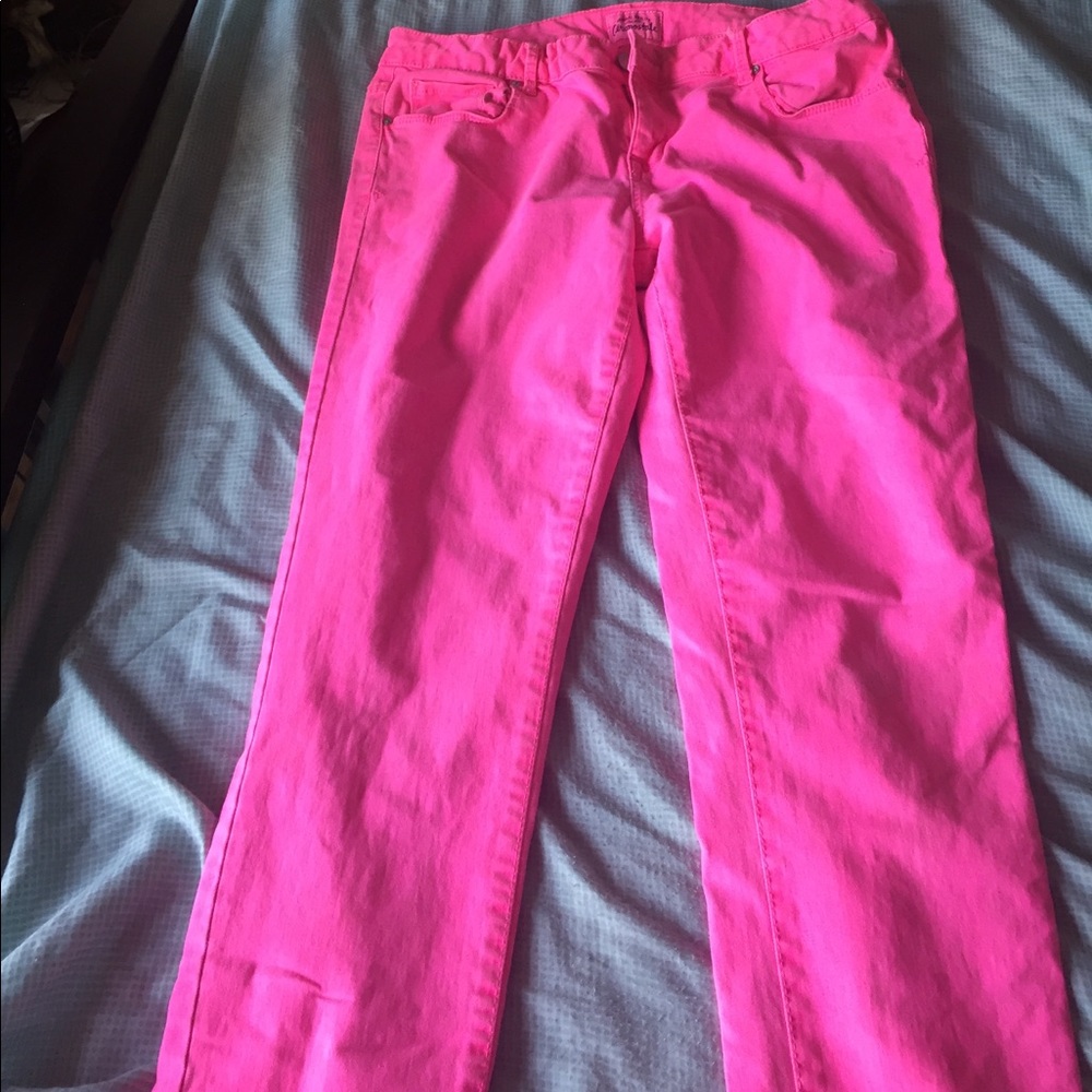 Bright pink skinny jeans