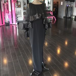 Breathtaking black dress with mesh cape