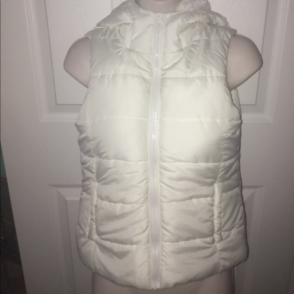 white fur vest