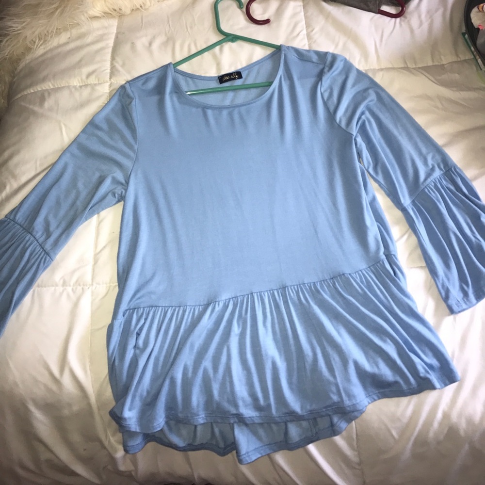 Never worn blue peplum top from Francesca's!