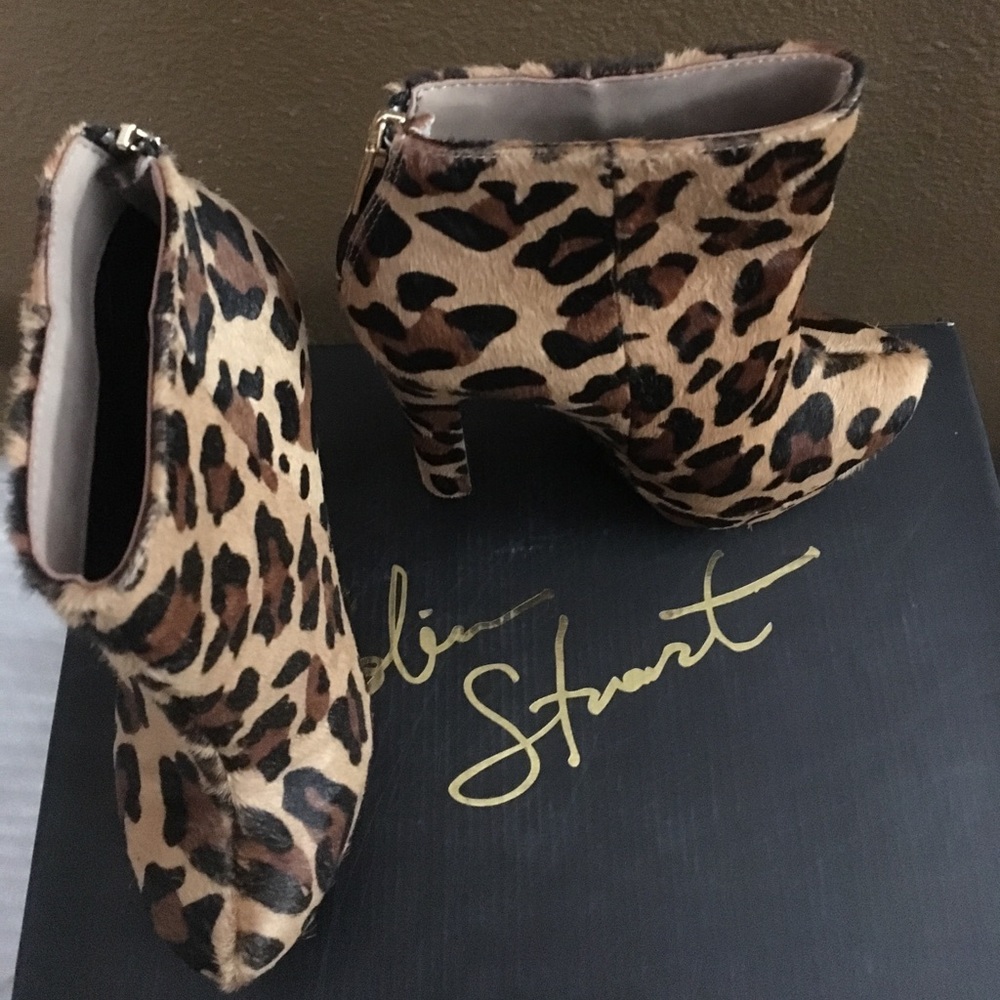 Colin Stuart leopard fur platform booties.