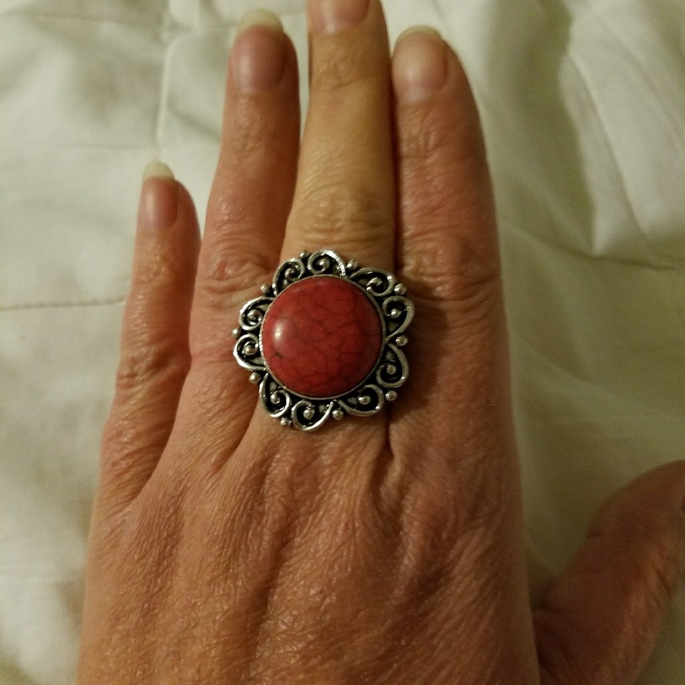 Antiquated silver stretchy ring with red stone