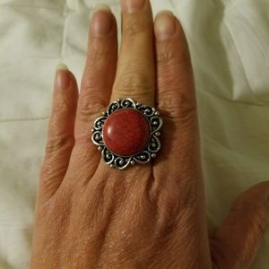 Antiquated silver stretchy ring with red stone