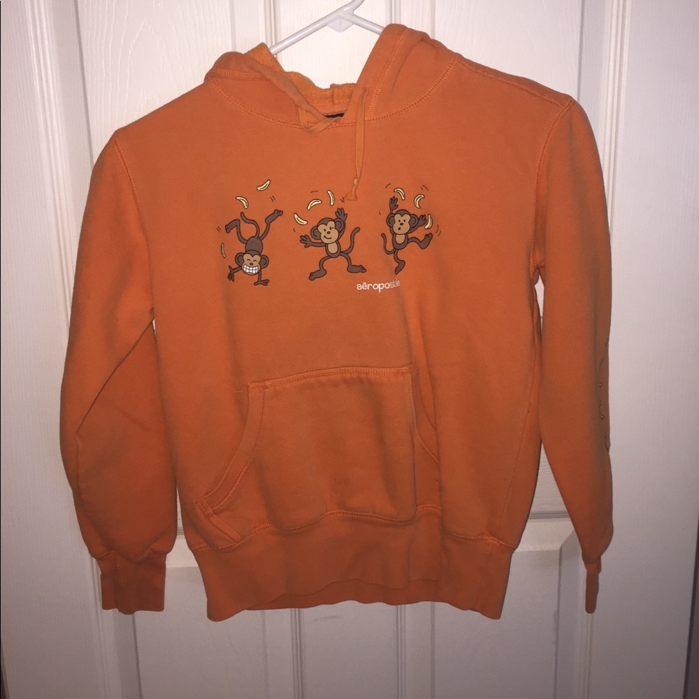 orange monkey sweatshirt
