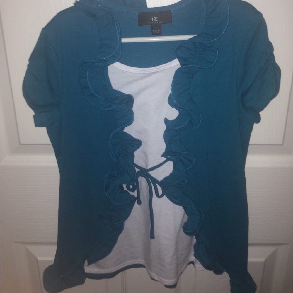 built in white top with blue sweater