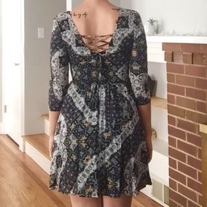 Patterned dress with cute back detail. Like new!