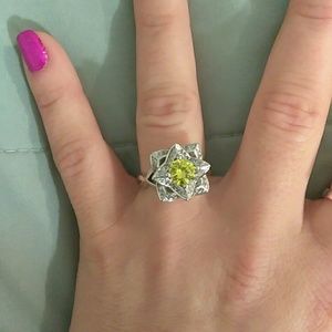 Flowered  design yellow gem centered in sterling s