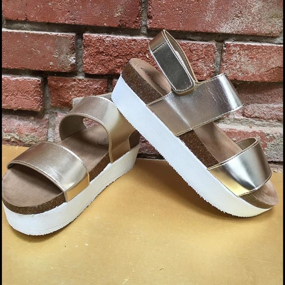 Brand new in box gold platform sandals
