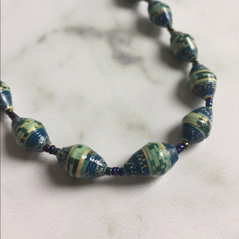 Rolled bead necklace.