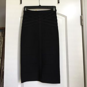 Euc black BeBe bandage skirt w/ gold zipper