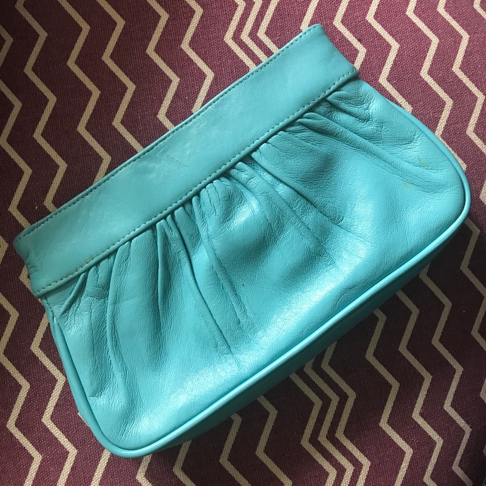 Temma Dahan leather clutch
