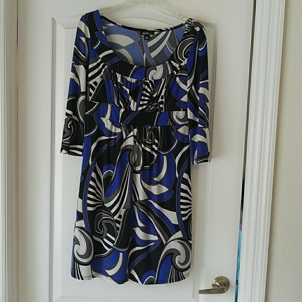 Party dress with 3/4 sleeve. Poly spandex blend