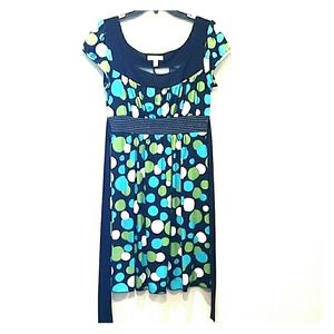 Polka dot baby doll like dress with tie in back
