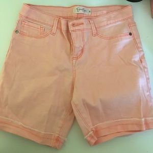 Pink mid thigh shorts