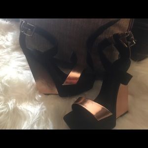 Metallic rose gold and black wedges..Size 8