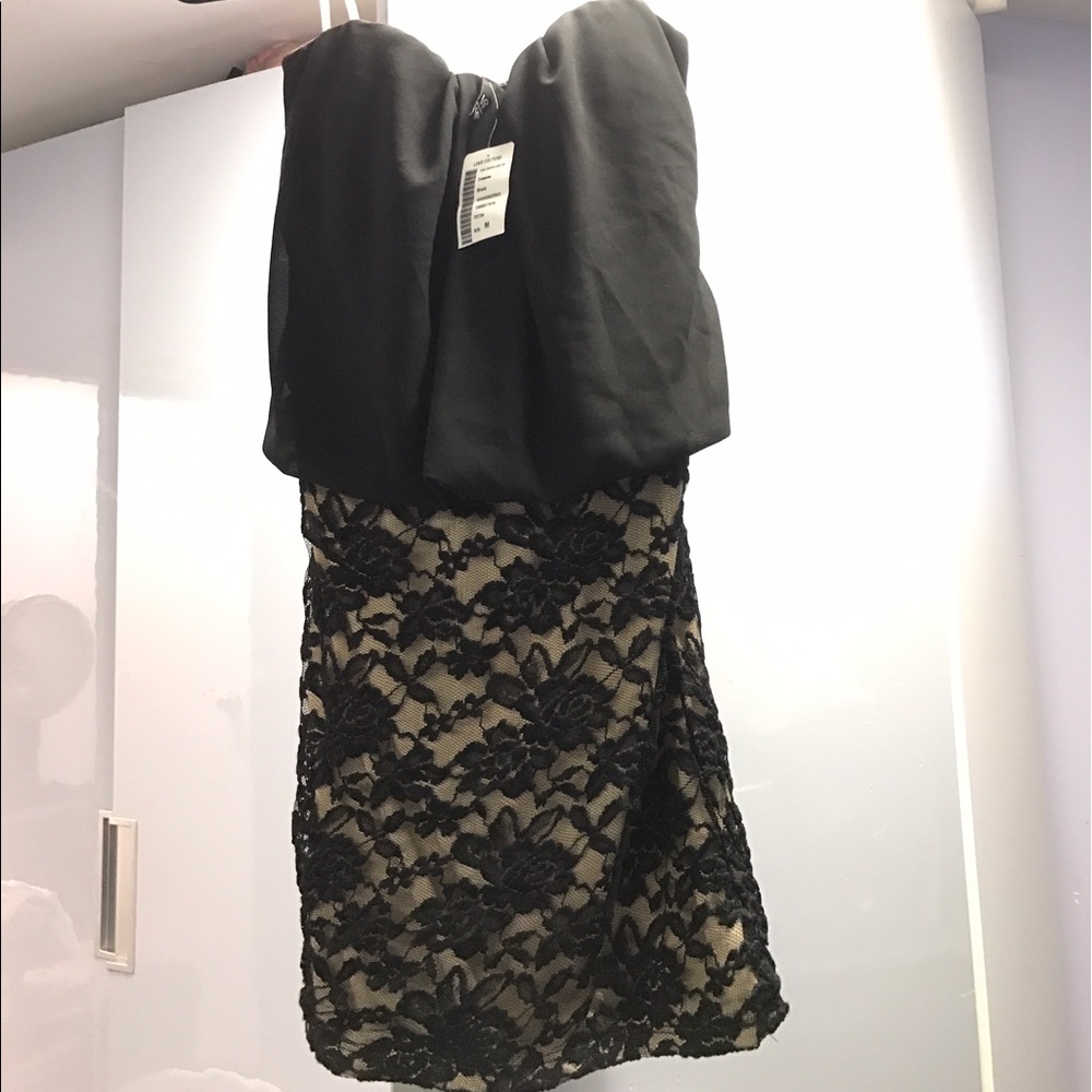 Strapless black dress with a lace bottom