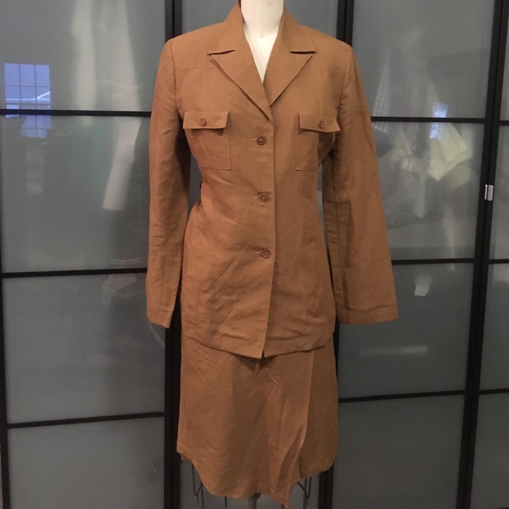 Butterscotch linen suit with asymmetrical skirt.