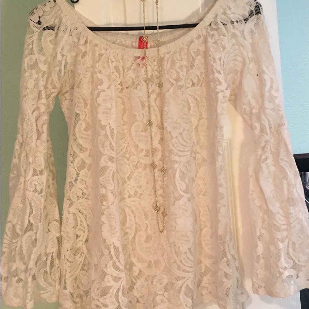 Cream colored lac bell sleeve shirt