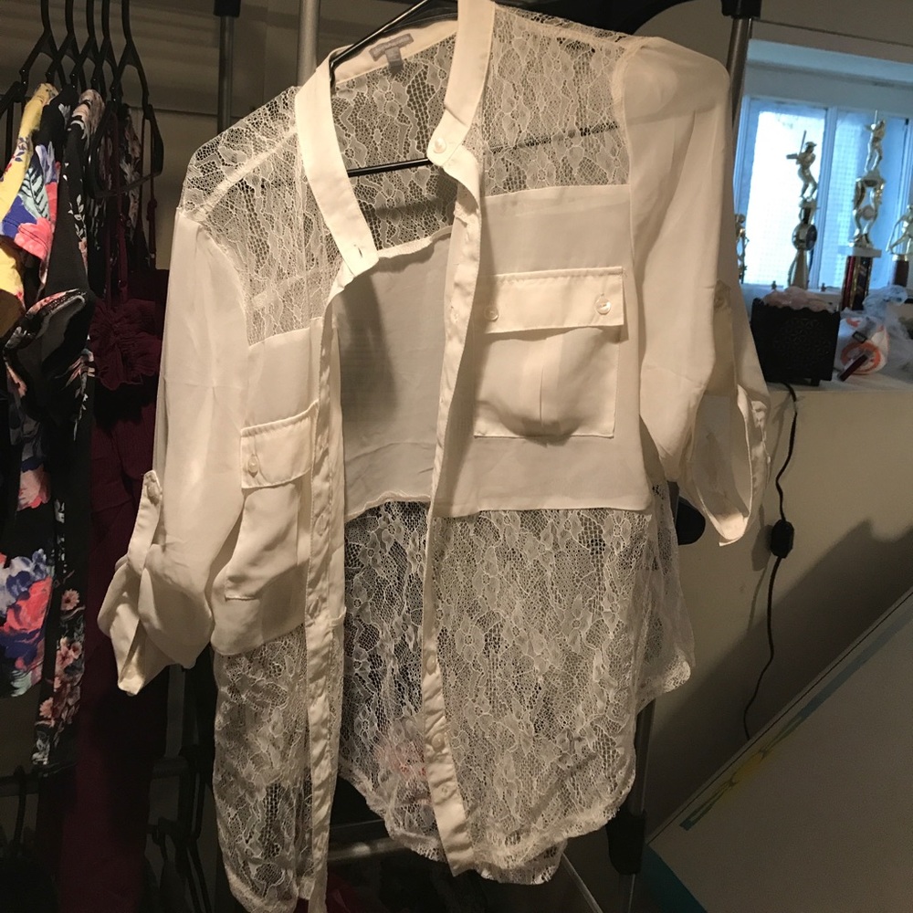 White, button up blouse.