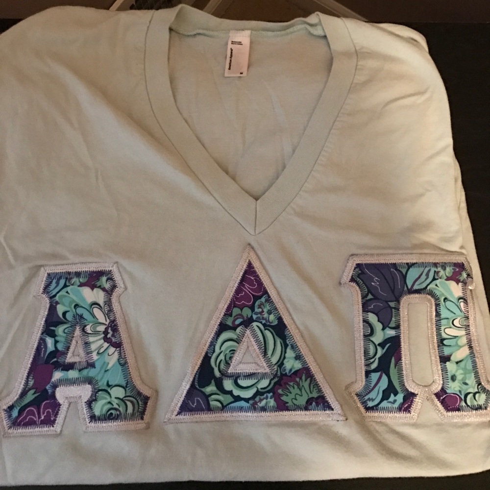 ADPI letters turquoise tee with patterned letters