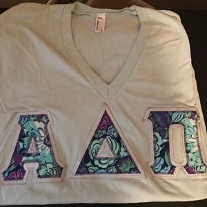 ADPI letters turquoise tee with patterned letters