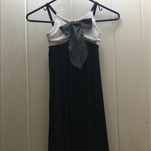 kid black and white dress formal setting