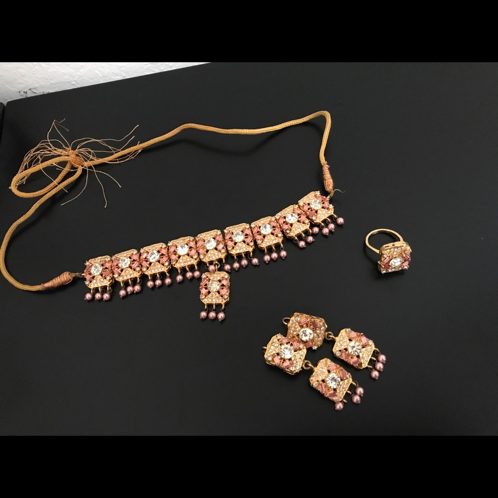 Necklace with earrings and a ring