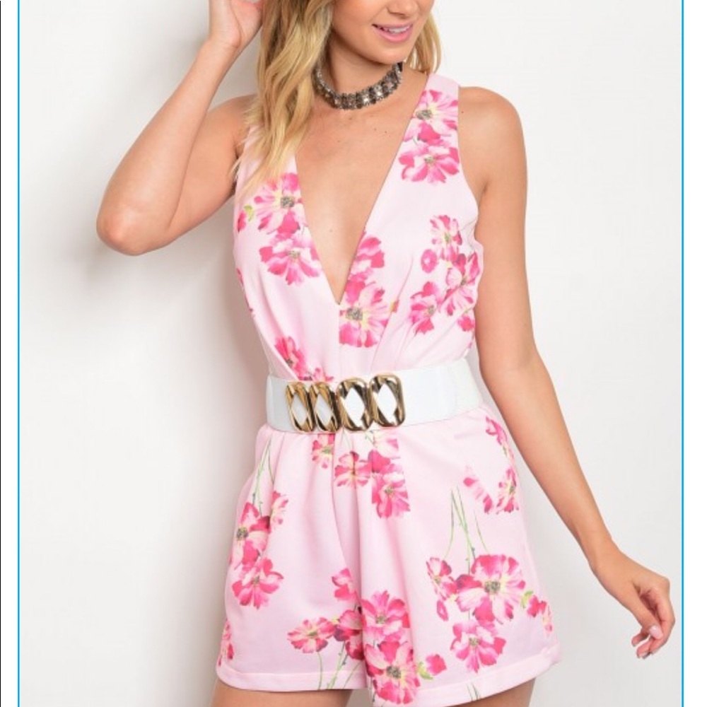 pink and white flowered romper. SALE! HP🎉@spyral.