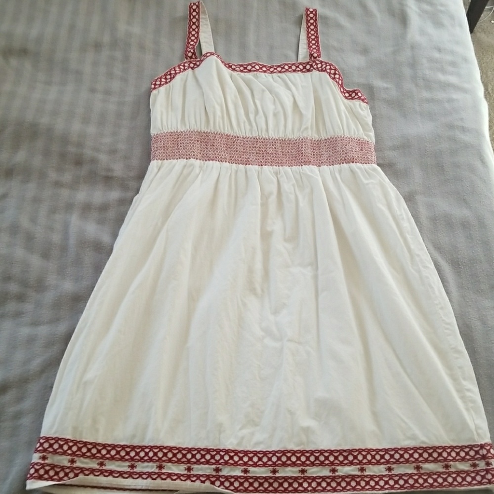 White dress with embroidered detailing